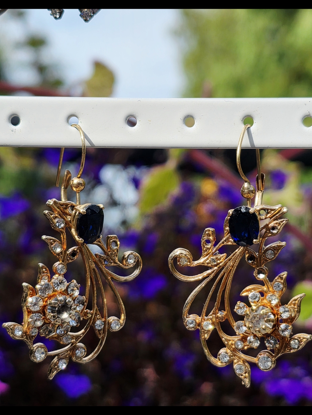 Gold-Tone Floral Drop Earrings with Blue Gem Accents